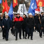 Улуттук университетте Ак калпак жана улуттук кийимдер күнүнө арналган жөө жүрүш өттү